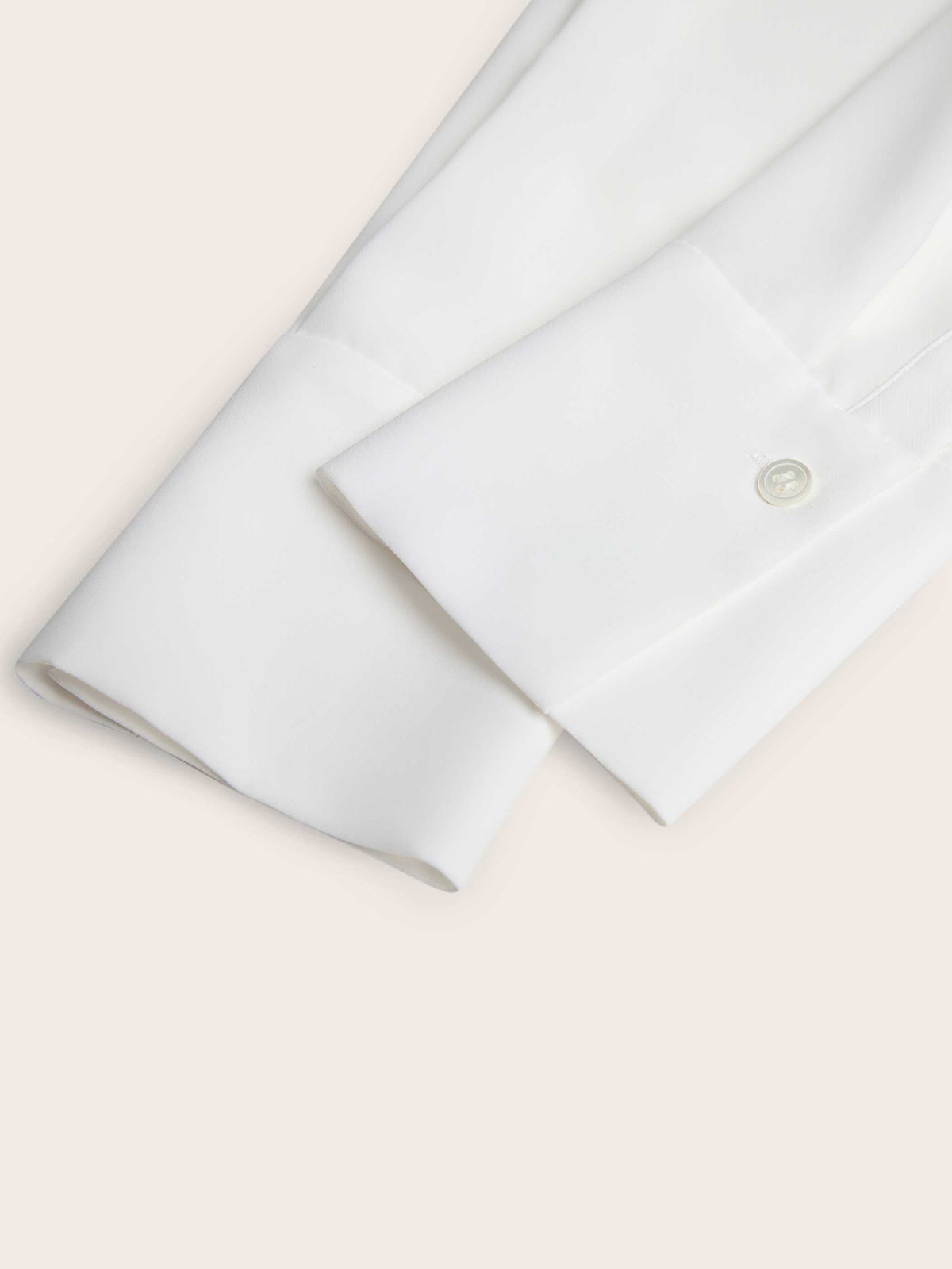 Dahlia Pleated Button 
Down Blouse