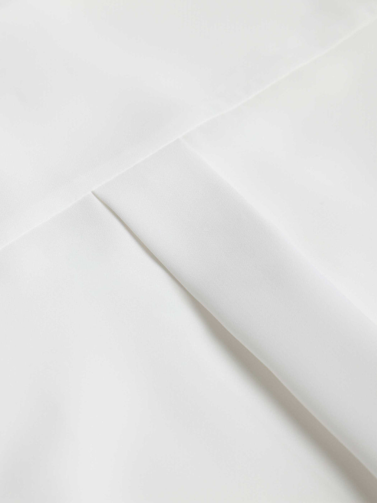 Dahlia Pleated Button 
Down Blouse